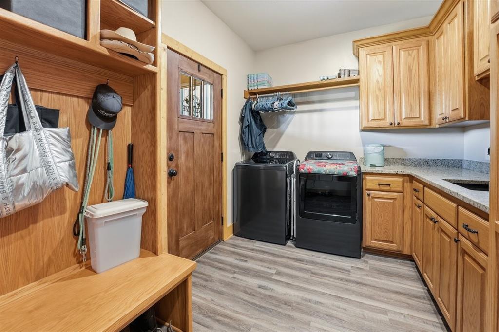 971 Bamboo Road Big Sandy, TX 75755 - Photo 25 of 40 a kitchen with stainless steel appliances a stove a refrigerator and cabinets