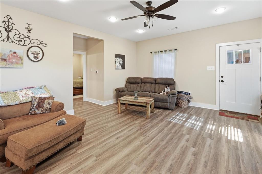 971 Bamboo Road Big Sandy, TX 75755 - Photo 28 of 40 a living room with furniture and a wooden floor