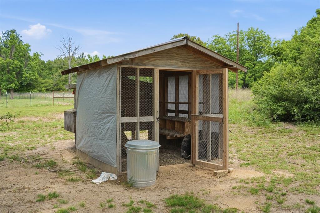971 Bamboo Road Big Sandy, TX 75755 - Photo 38 of 40 a front view of a house with a yard