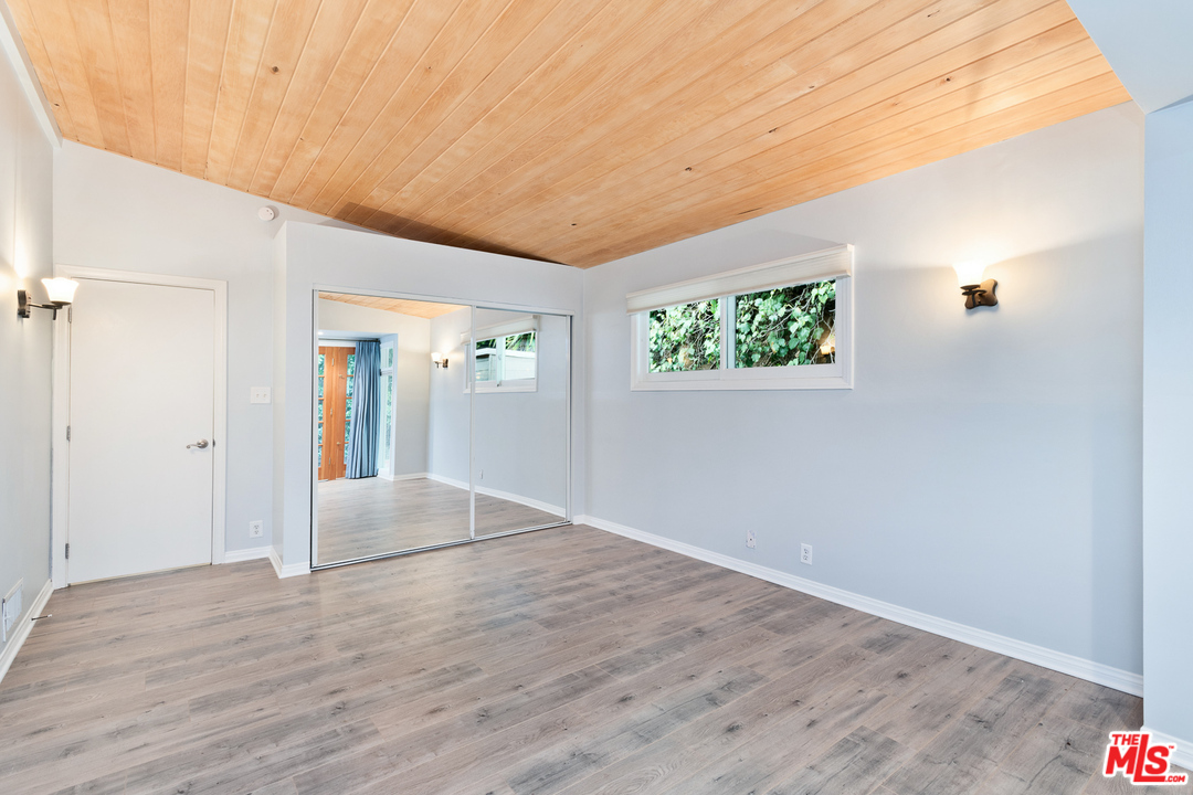 9614 Heather Road Beverly Hills, CA 90210 - Photo 10 of 26 wooden floor in an empty room