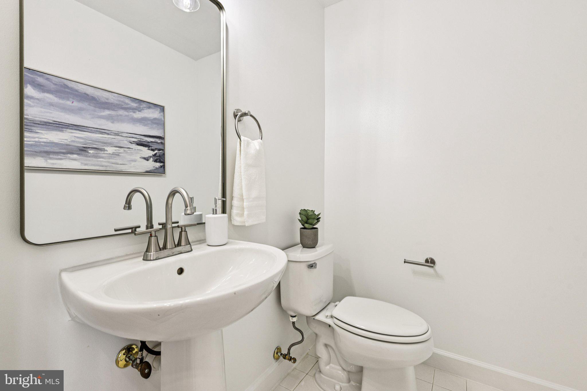 2746 Pembsly Drive Vienna, VA 22181 - Photo 15 of 46 a bathroom with a sink mirror and toilet