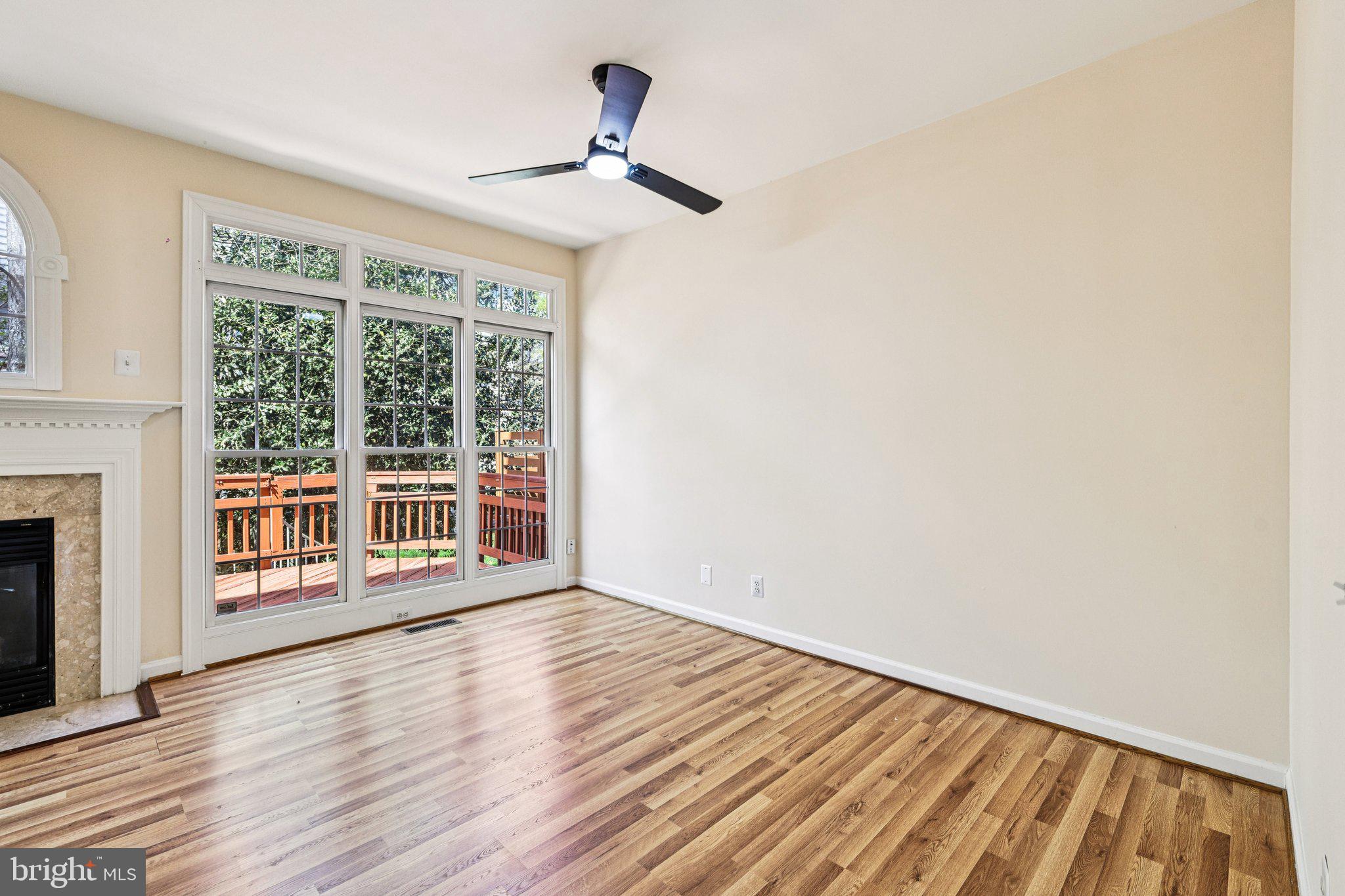 2746 Pembsly Drive Vienna, VA 22181 - Photo 16 of 46 a view of an empty room with wooden floor and a window