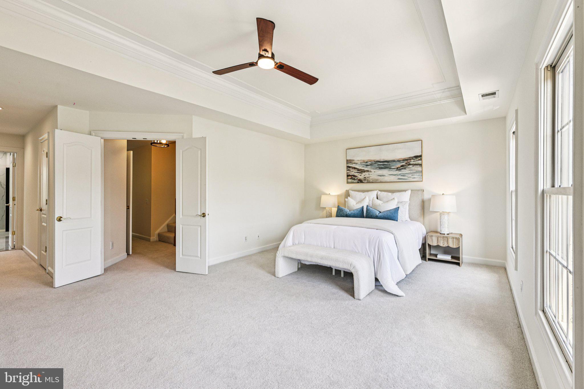 2746 Pembsly Drive Vienna, VA 22181 - Photo 18 of 46 a bedroom with a bed and a walk in closet