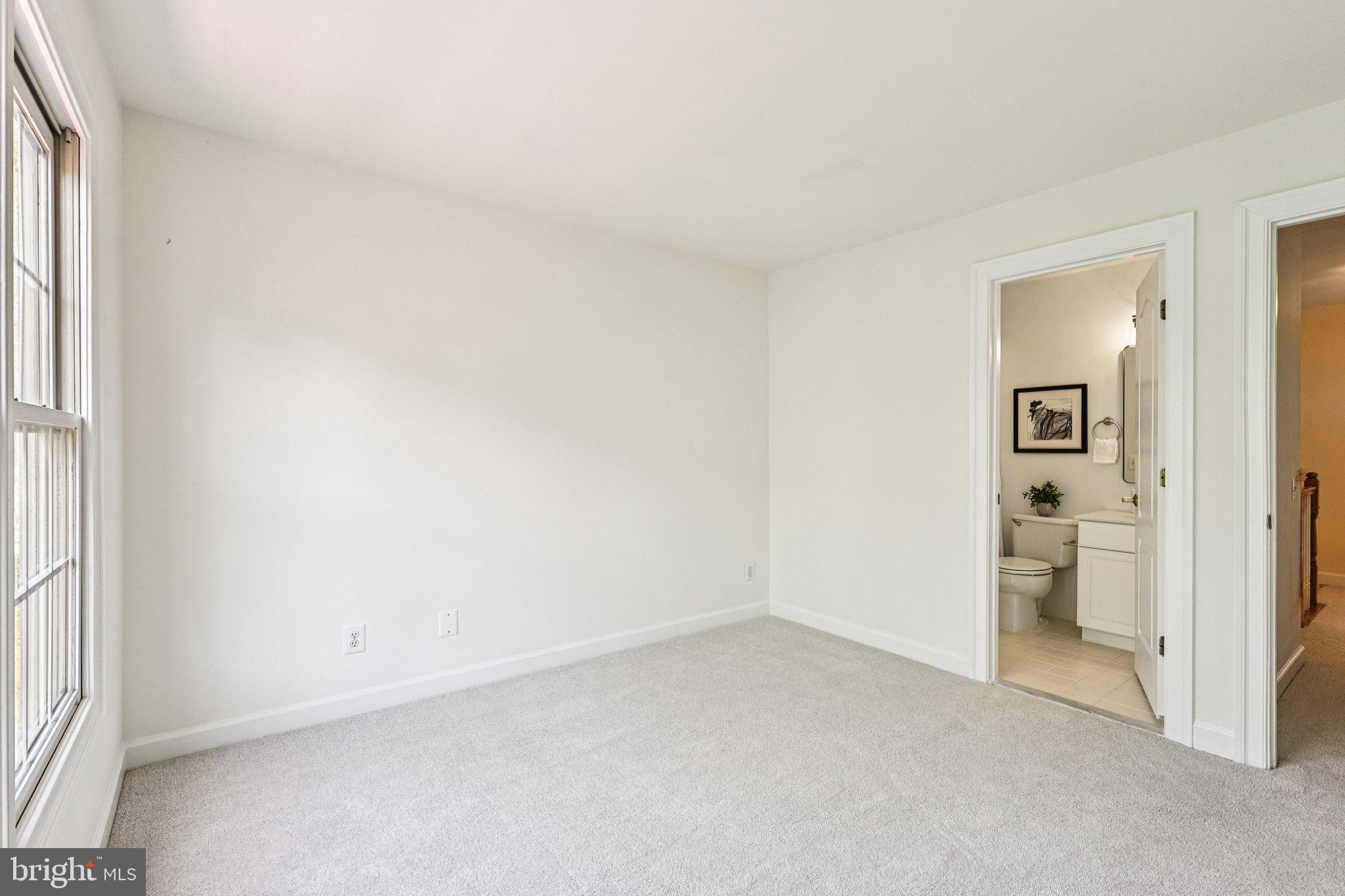 2746 Pembsly Drive Vienna, VA 22181 - Photo 24 of 46 an empty room with a cabinet and a window