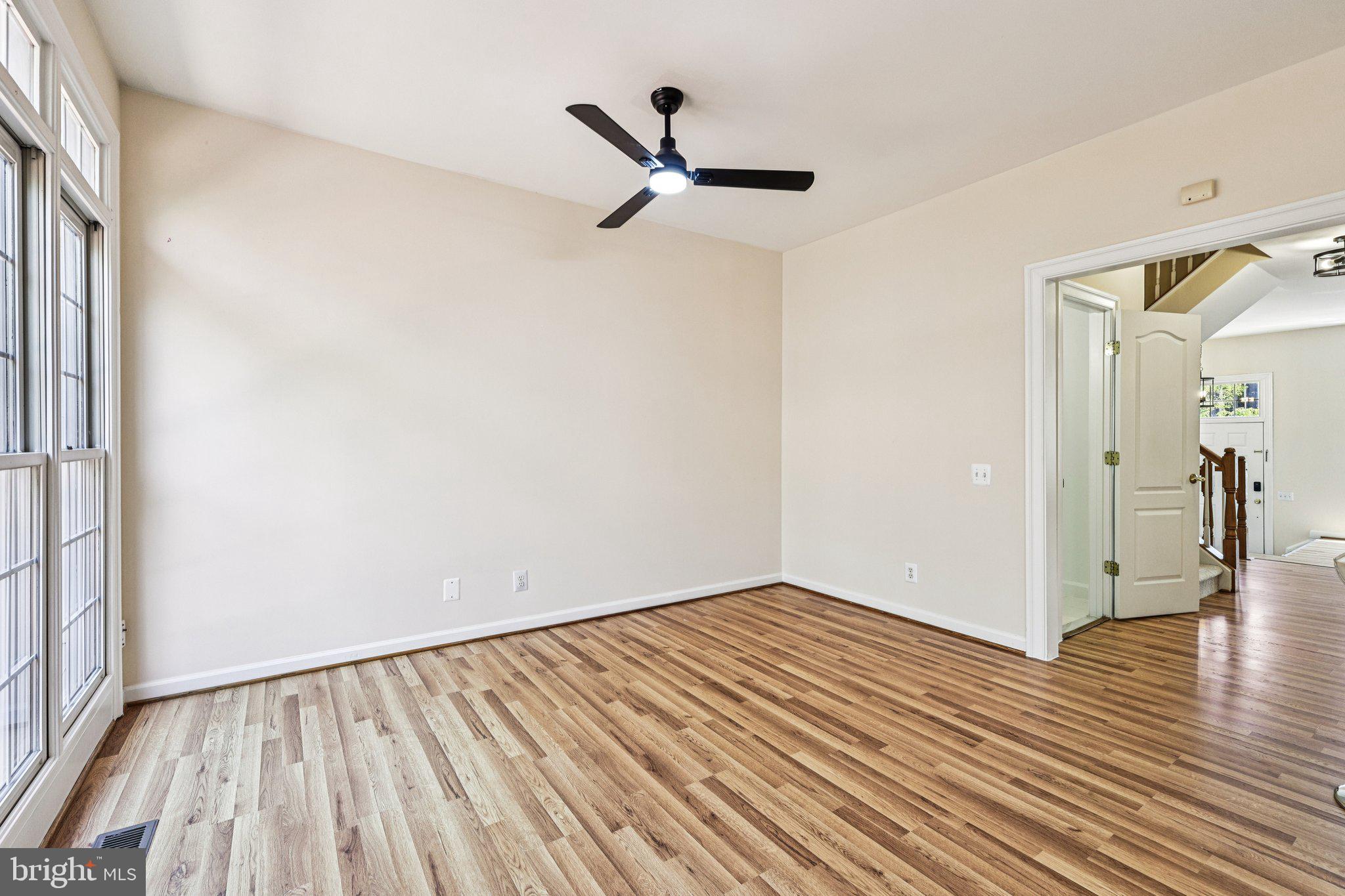 2746 Pembsly Drive Vienna, VA 22181 - Photo 31 of 46 a view of empty room with wooden floor and ceiling fan