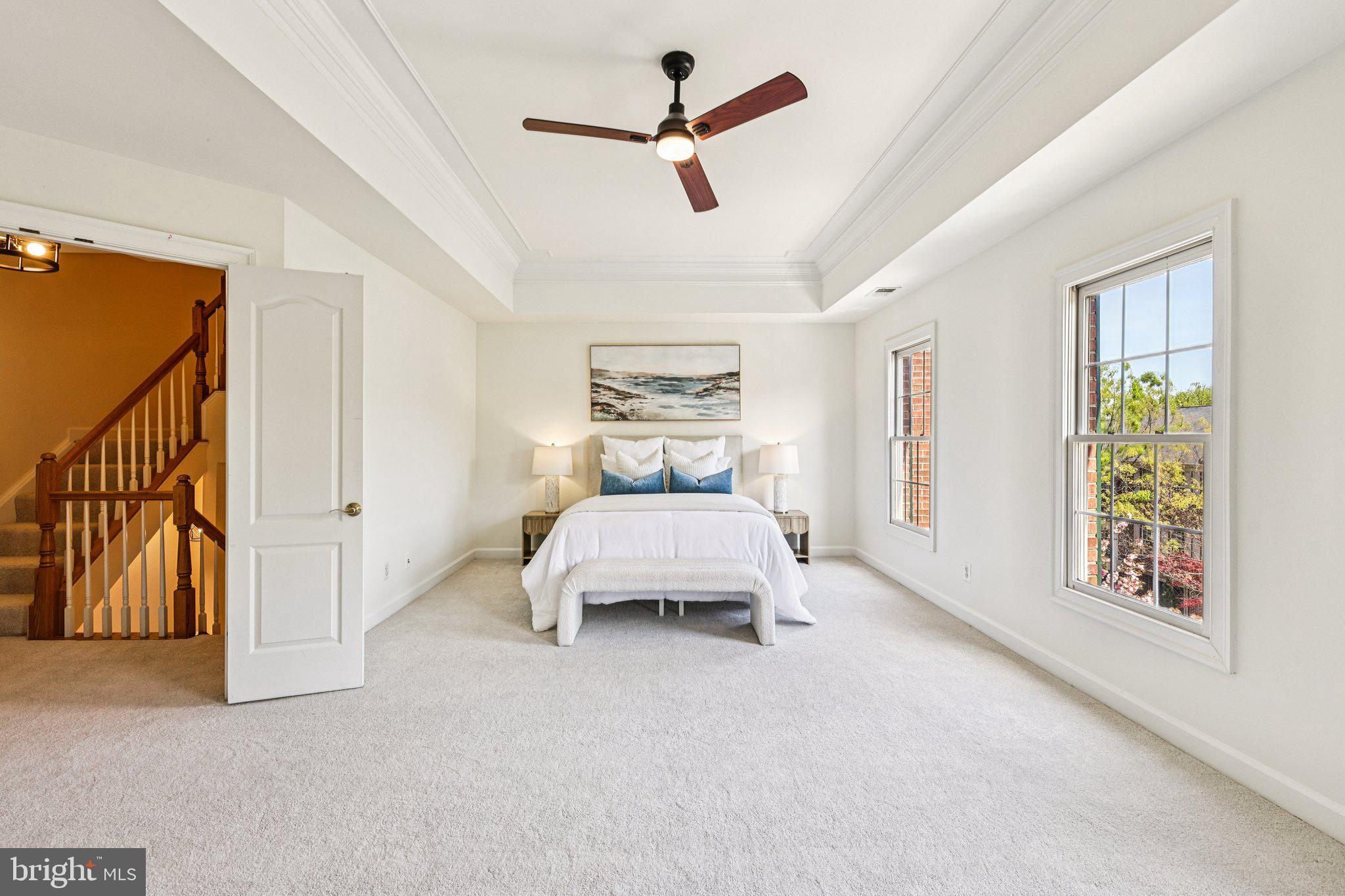 2746 Pembsly Drive Vienna, VA 22181 - Photo 32 of 46 a bedroom with a bed and a chandelier