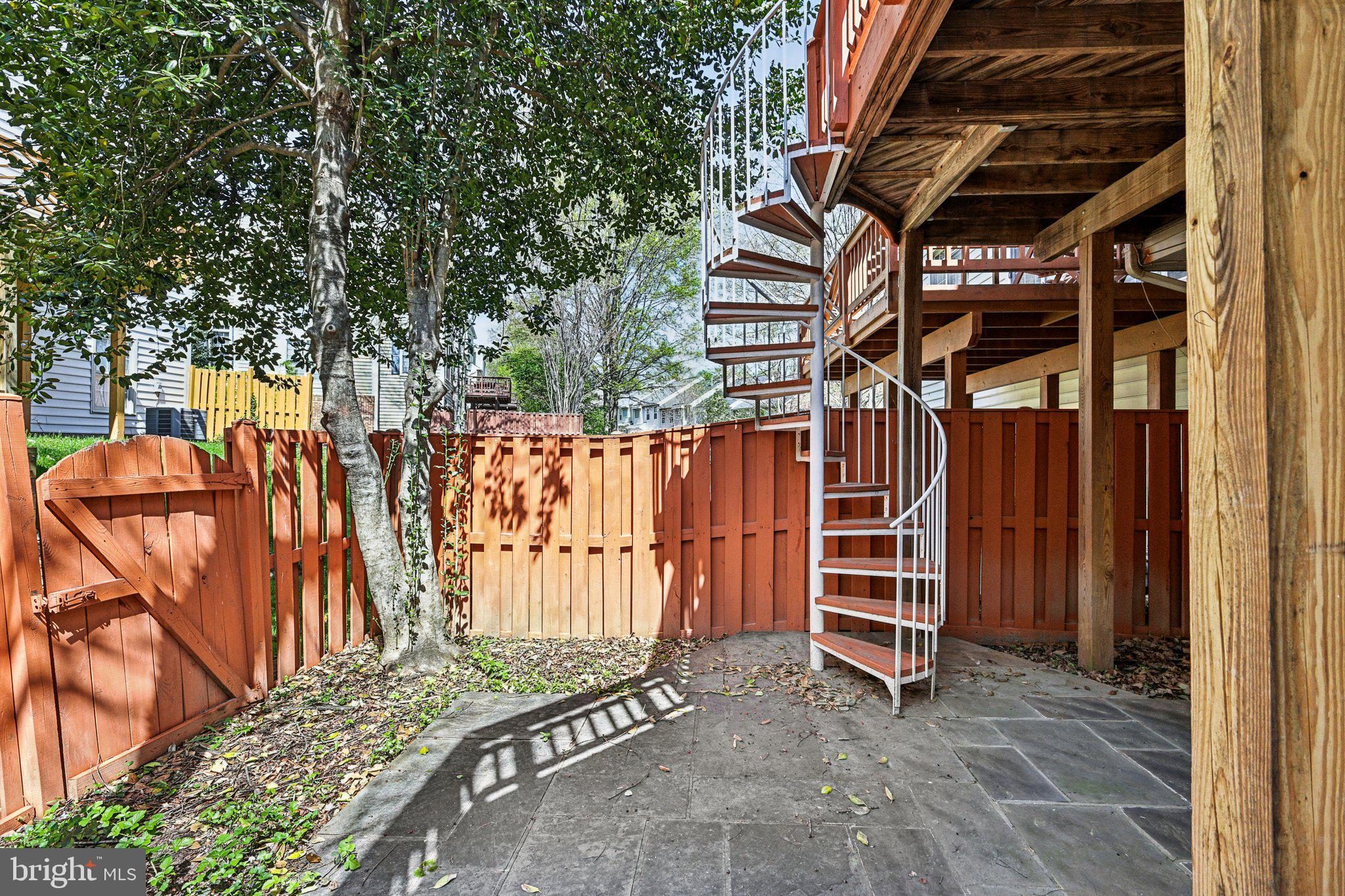 2746 Pembsly Drive Vienna, VA 22181 - Photo 42 of 46 a view of a backyard with stairs and a tree