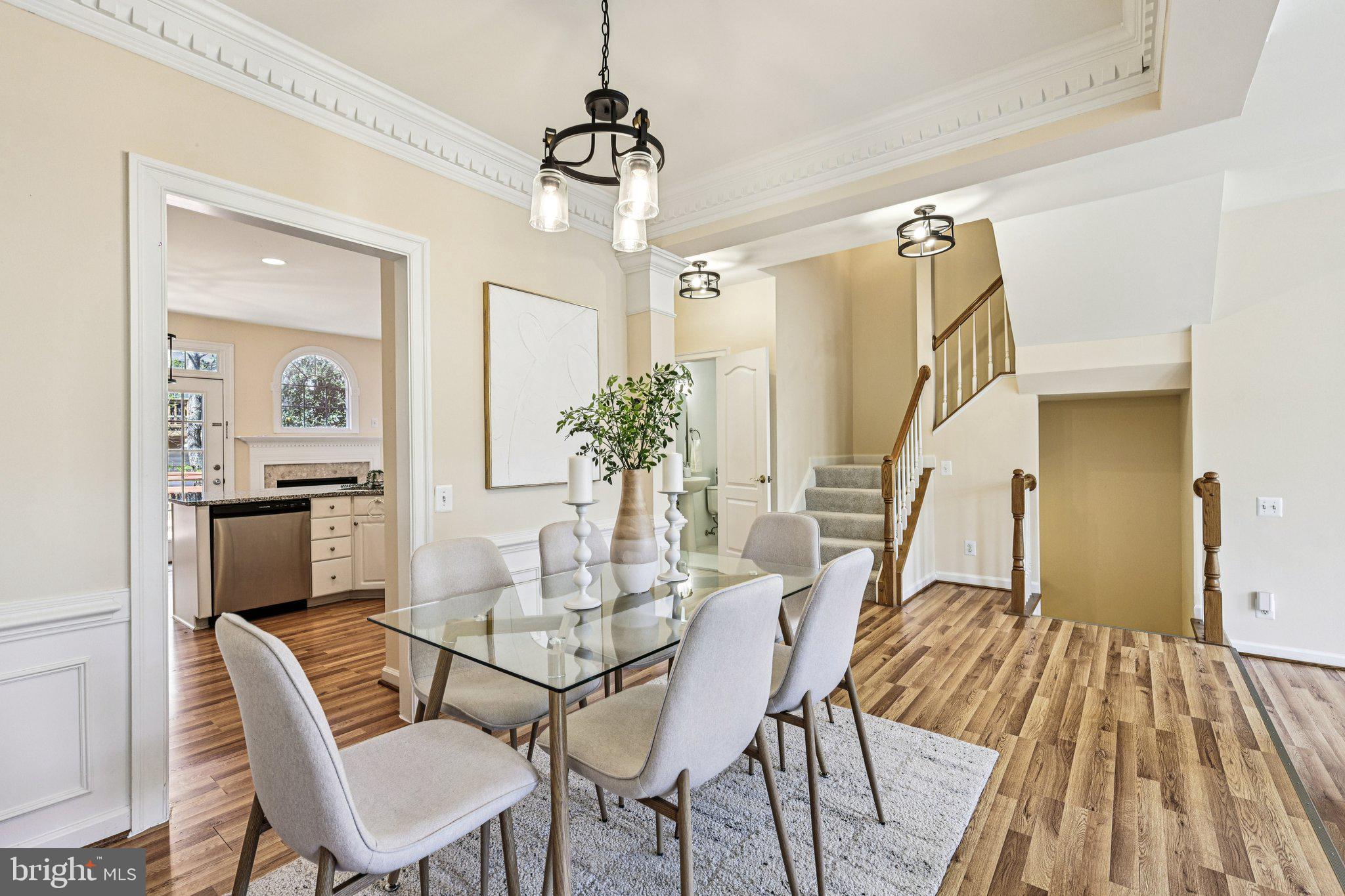 2746 Pembsly Drive Vienna, VA 22181 - Photo 7 of 46 a dining room with furniture a chandelier and wooden floor