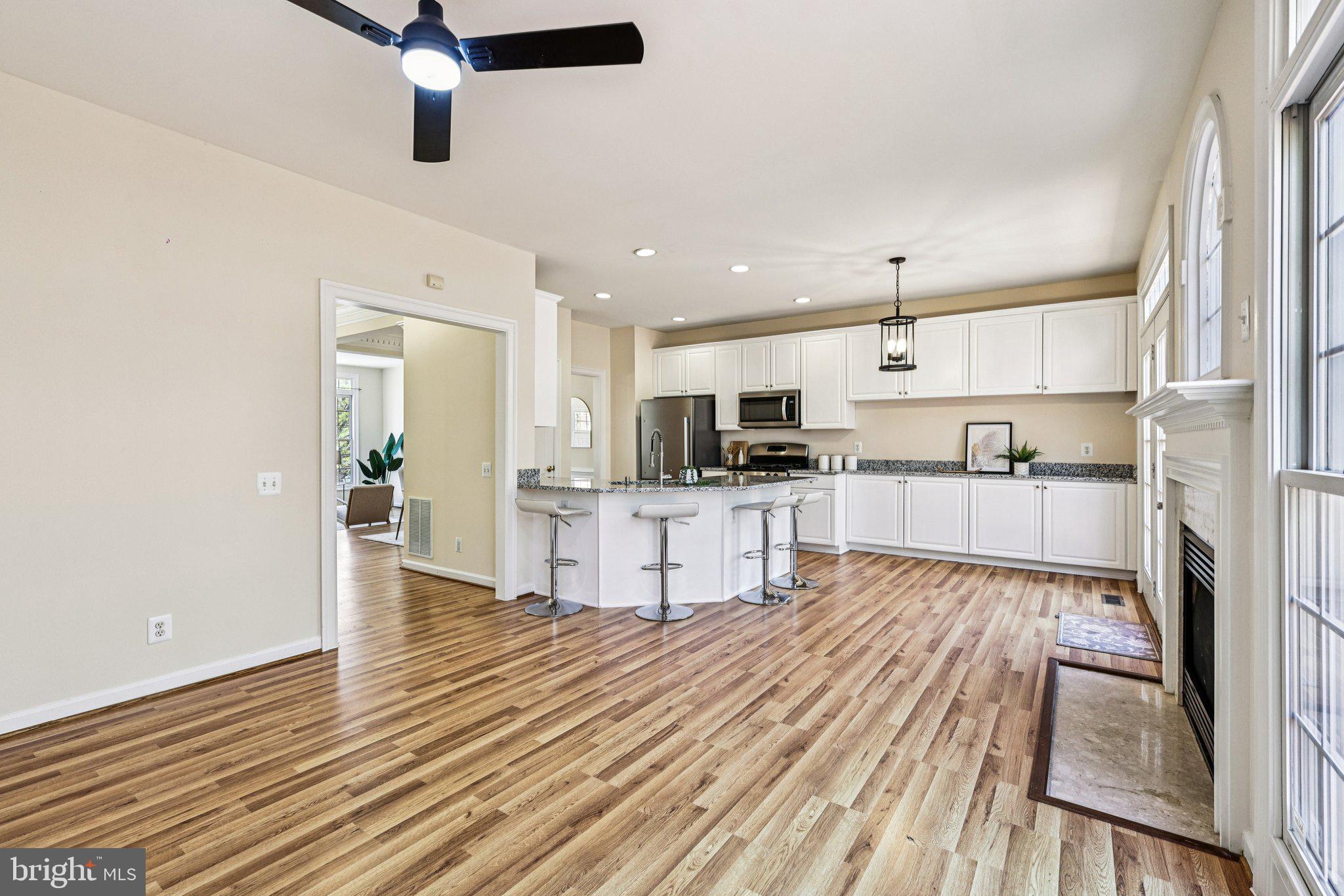 2746 Pembsly Drive Vienna, VA 22181 - Photo 10 of 46 a open kitchen with white cabinets and stainless steel appliances