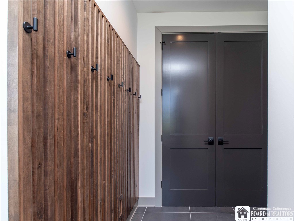 3034 Mandolin Rdg Way Chautauqua, NY 14757 - Photo 11 of 31 As you enter the home from the garage you will be