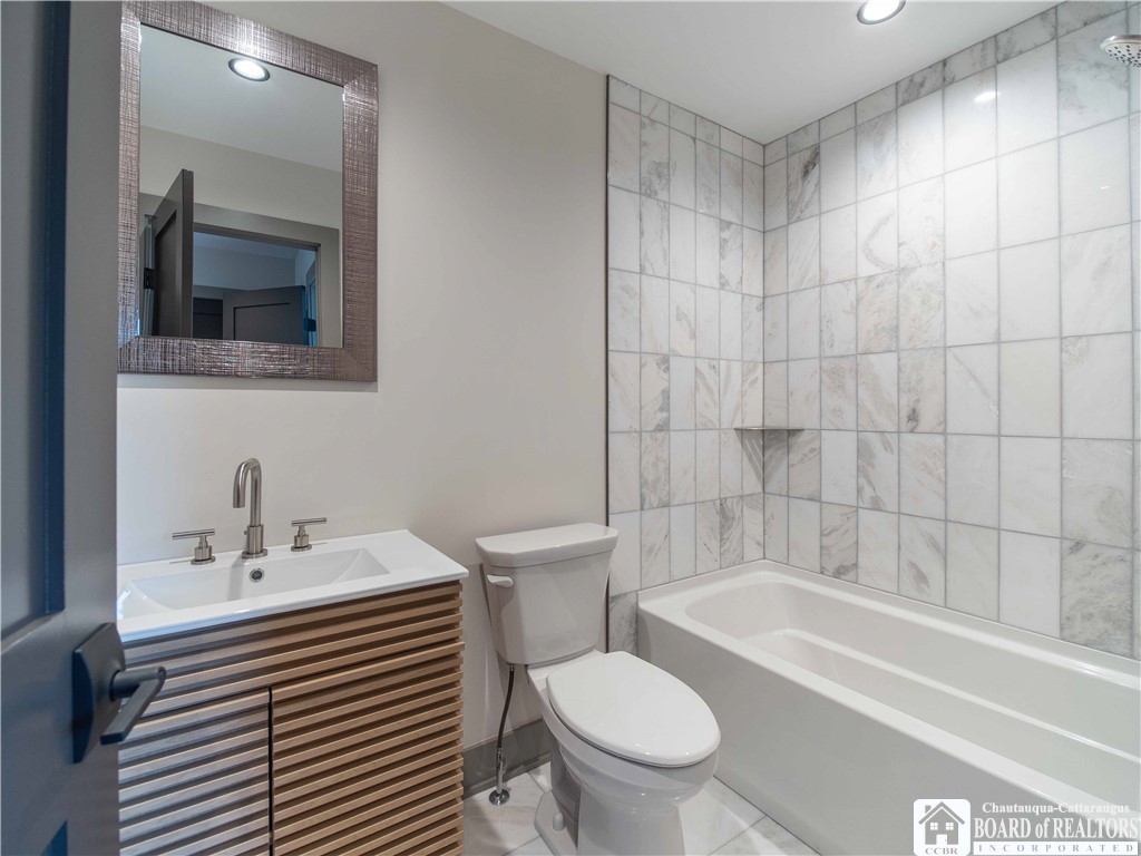 3034 Mandolin Rdg Way Chautauqua, NY 14757 - Photo 22 of 31 The full modern bath on the second floor services