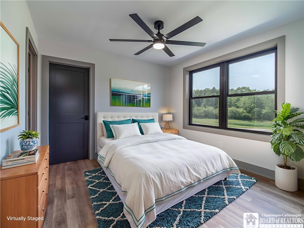 3034 Mandolin Rdg Way Chautauqua, NY 14757 - Photo 24 of 31 Virtually staged third bedroom.