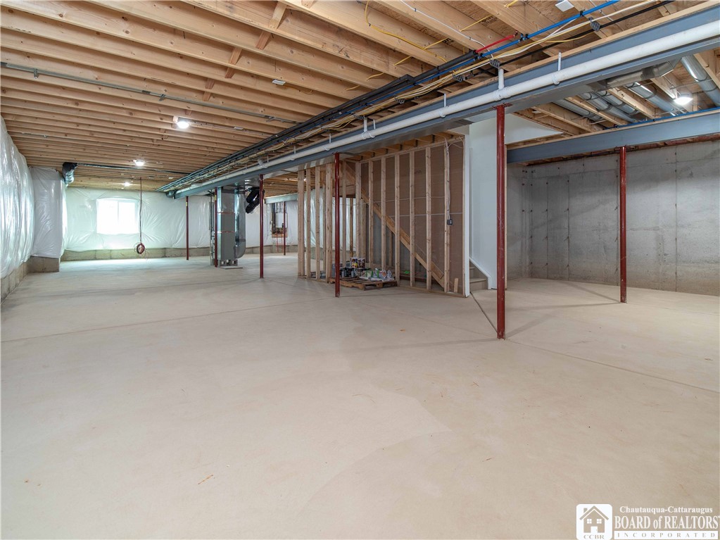 3034 Mandolin Rdg Way Chautauqua, NY 14757 - Photo 26 of 31 The full basement is equipped with legal egress wi