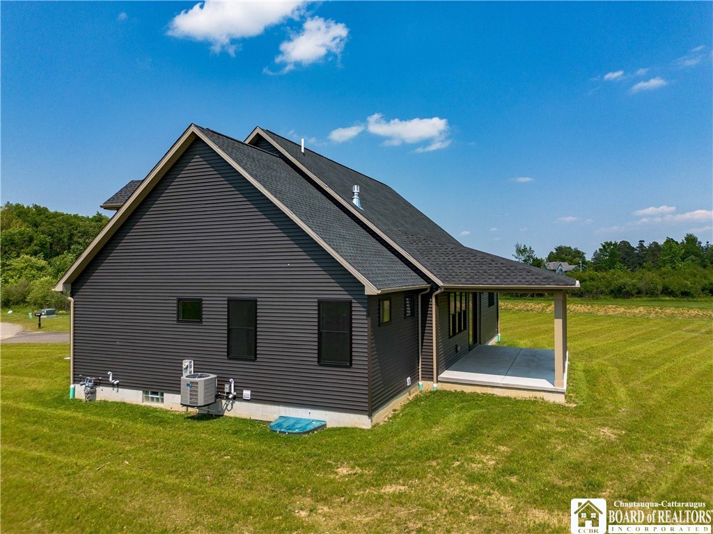 3034 Mandolin Rdg Way Chautauqua, NY 14757 - Photo 28 of 31 Through the sliding glass doors at the back of the