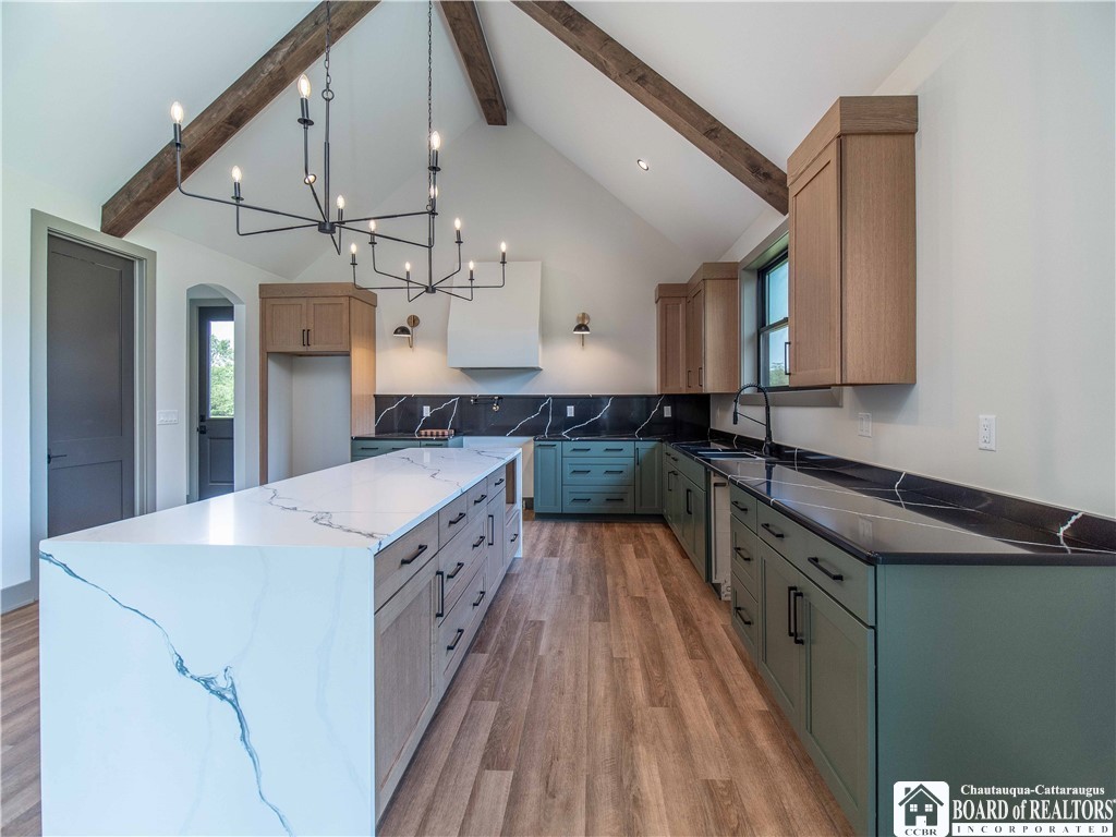 3034 Mandolin Rdg Way Chautauqua, NY 14757 - Photo 7 of 31 The open concept kitchen is equipped with plenty o