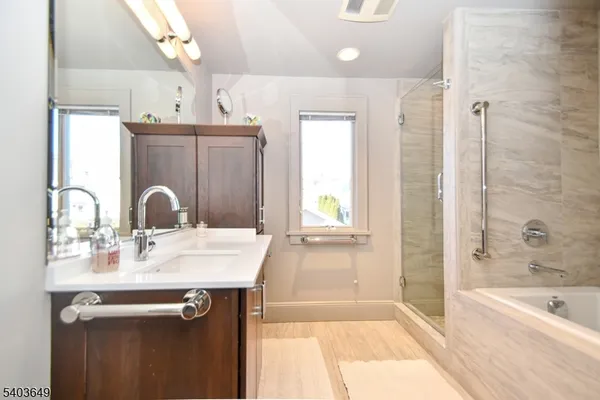 a bathroom with a sink and a bathtub