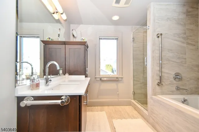 a bathroom with a sink and a bathtub