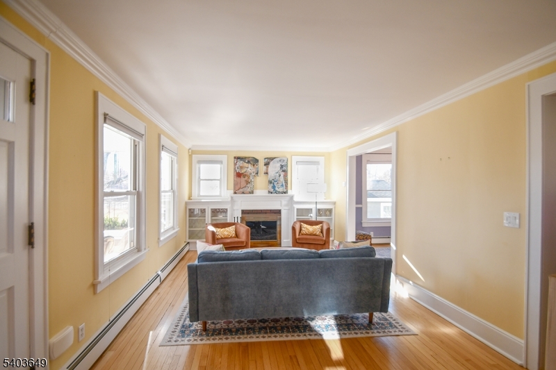 11 Morris Court Summit, NJ 07901 - Photo 2 of 16 a living room with furniture and a large window