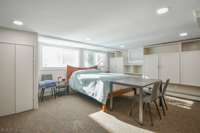 11 Morris Court Summit, NJ 07901 - Photo 10 of 16 a bedroom with a bed and a table