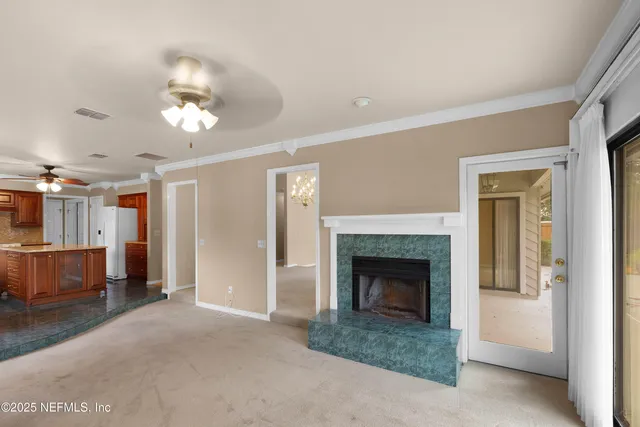 a view of a livingroom with a fireplace