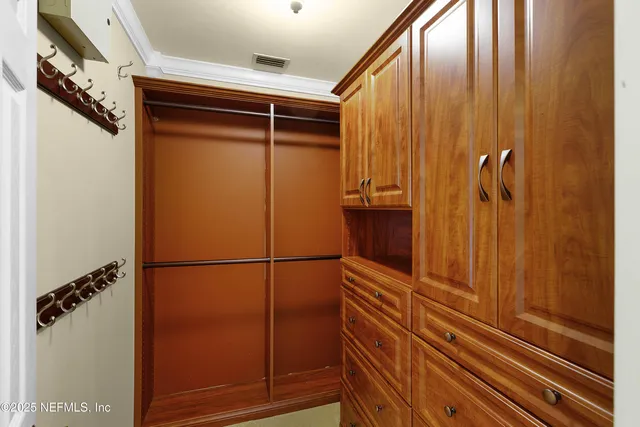 a bathroom with a shower and a mirror