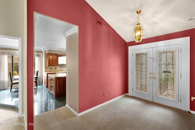 a view of a hallway with interior of the house