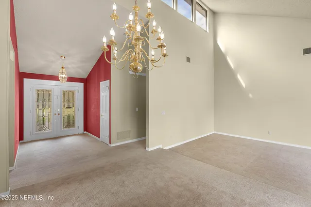 a view of a livingroom with a chandelier