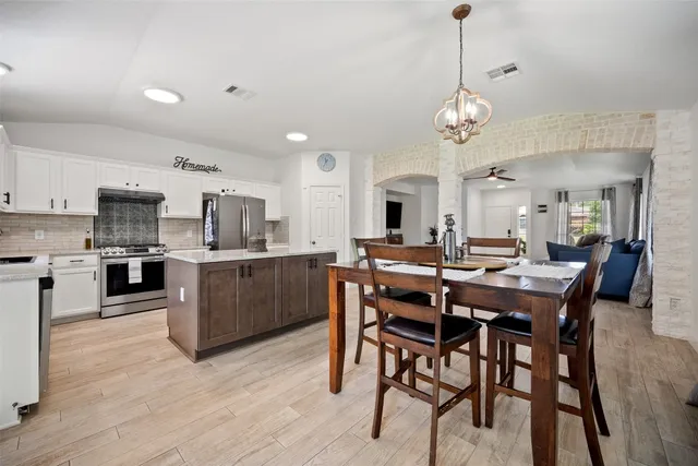 a house with a tree in front of it