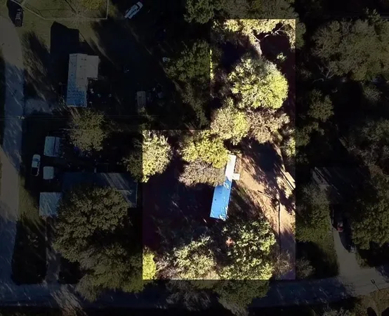 a view of a house with a swimming pool