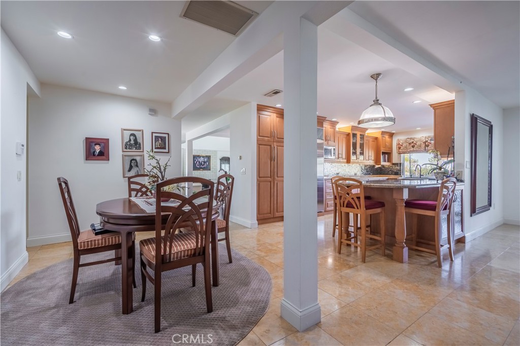 8213 Seranata Drive Whittier, CA 90603 - Photo 17 of 64 a view of a dining room with furniture