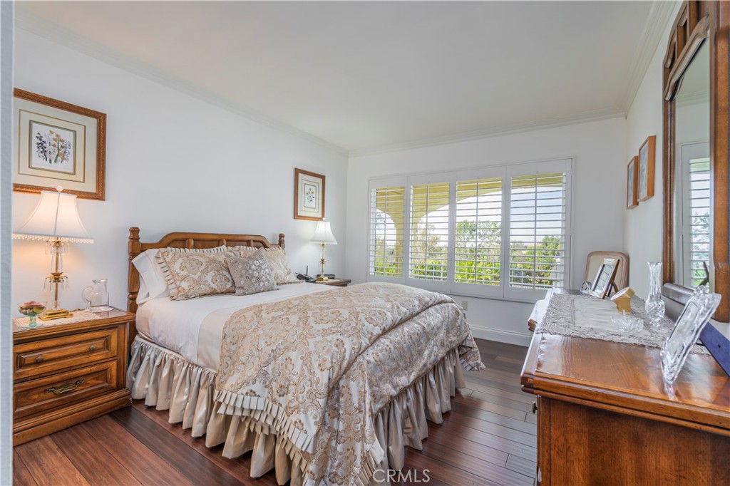 8213 Seranata Drive Whittier, CA 90603 - Photo 24 of 64 a bedroom with a bed and a large window