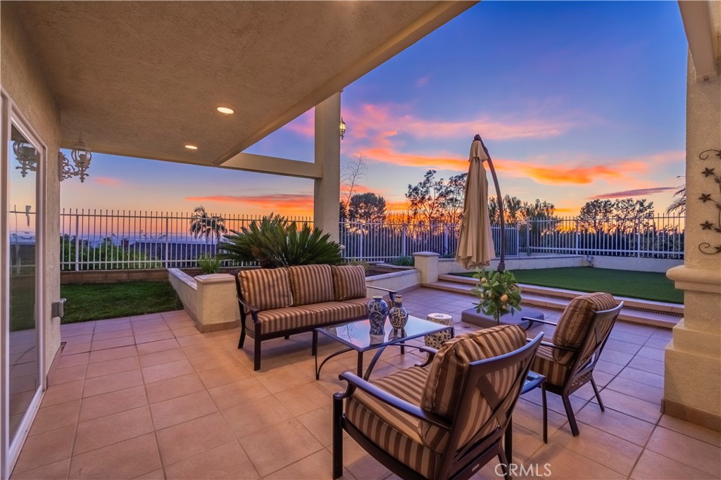 8213 Seranata Drive Whittier, CA 90603 - Photo 40 of 64 a view of a patio with couches and table and chairs
