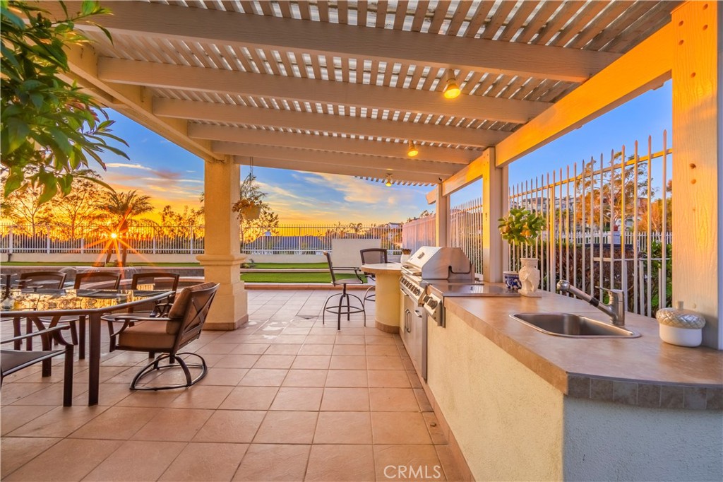 8213 Seranata Drive Whittier, CA 90603 - Photo 45 of 64 a view of a patio with a table and chairs