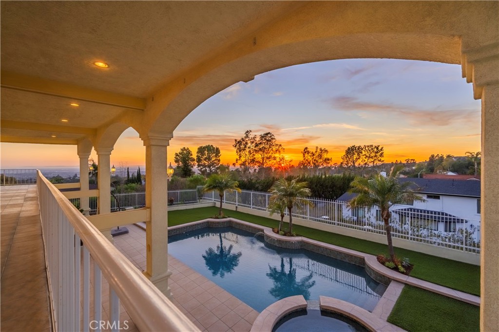 8213 Seranata Drive Whittier, CA 90603 - Photo 49 of 64 a view of a chairs and table in the balcony