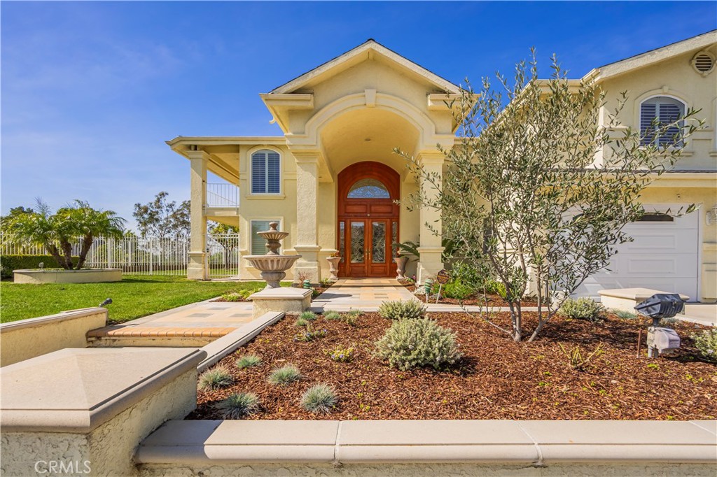 8213 Seranata Drive Whittier, CA 90603 - Photo 53 of 64 a view of a house with backyard and sitting area