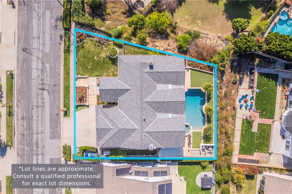 8213 Seranata Drive Whittier, CA 90603 - Photo 62 of 64 a aerial view of a house with a yard and potted plants