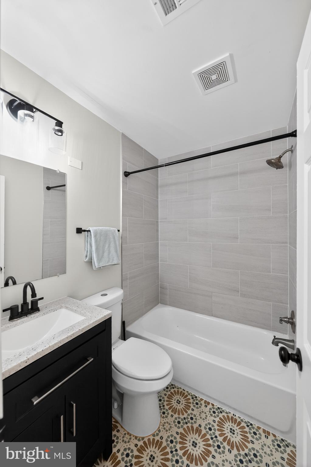3670 5th Avenue Edgewater, MD 21037 - Photo 17 of 60 a bathroom with a granite countertop sink toilet and shower