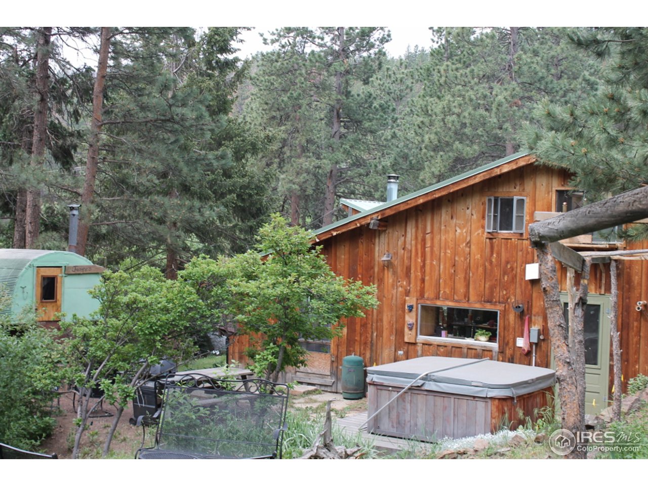 11220 Rist Canyon Road Bellvue, CO 80512 - Photo 12 of 25 a view of a back yard of the house