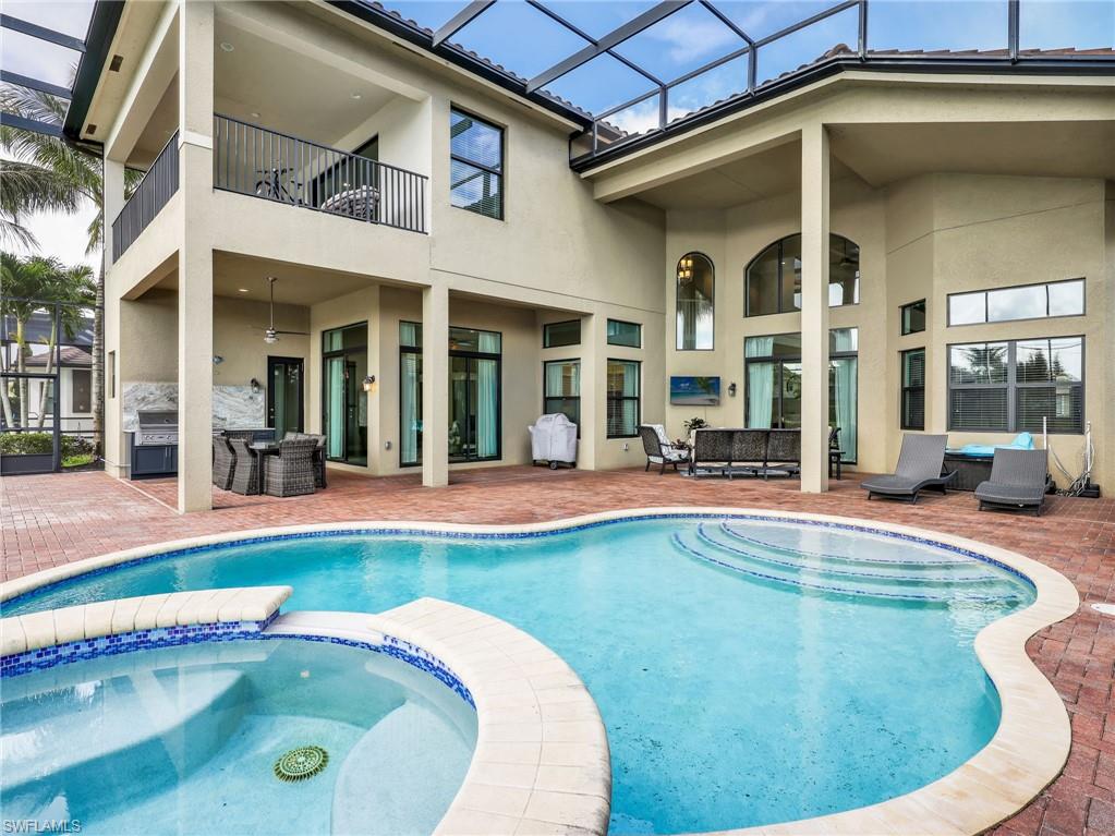 2756 Crystal Way Naples, FL 34119 - Photo 43 of 50 a view of a house with swimming pool