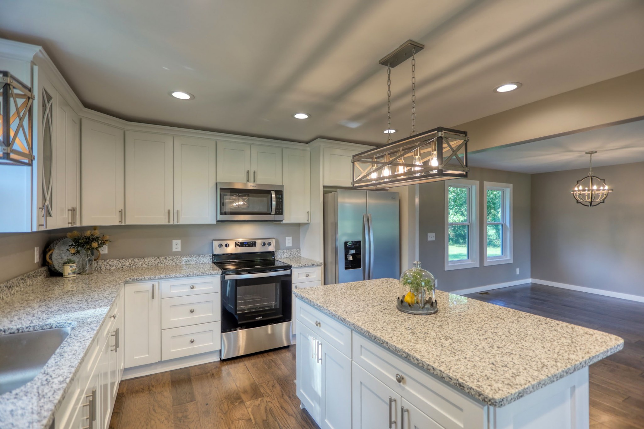 120 Vantrease Road Cottontown, TN 37048 - Photo 13 of 31 a kitchen with stainless steel appliances granite countertop a sink stove and refrigerator