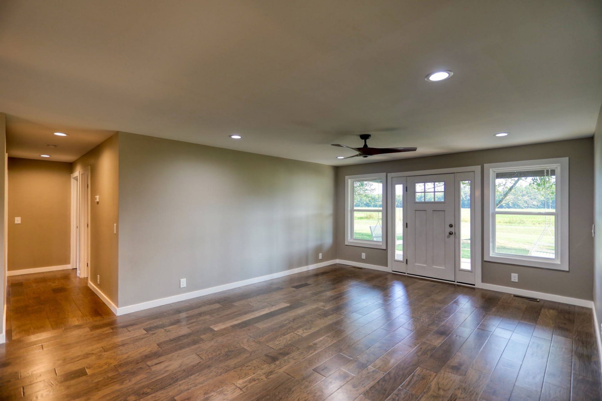 120 Vantrease Road Cottontown, TN 37048 - Photo 16 of 31 a view of an empty room with wooden floor and a window