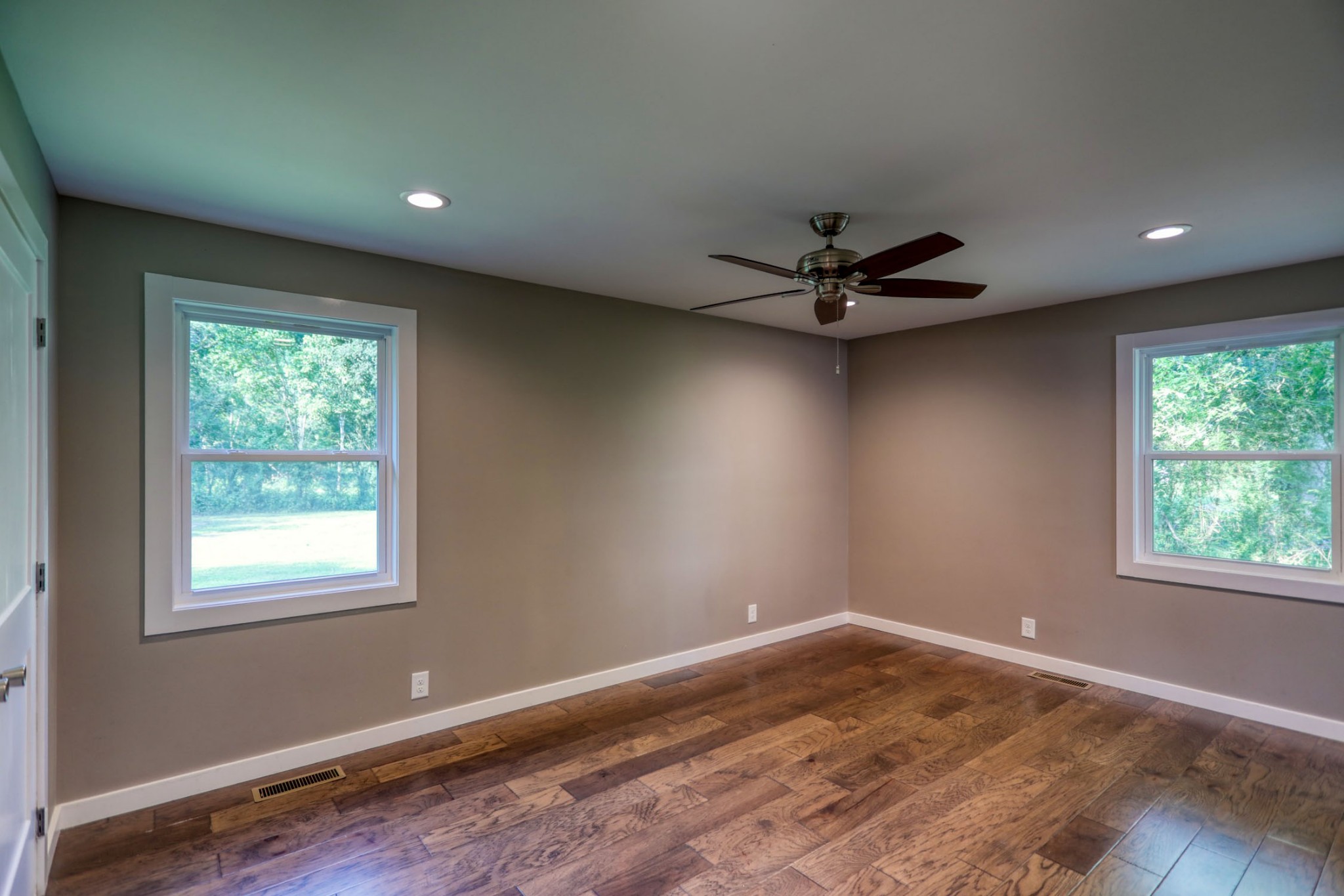 120 Vantrease Road Cottontown, TN 37048 - Photo 18 of 31 a view of a livingroom with a ceiling fan and wooden floor