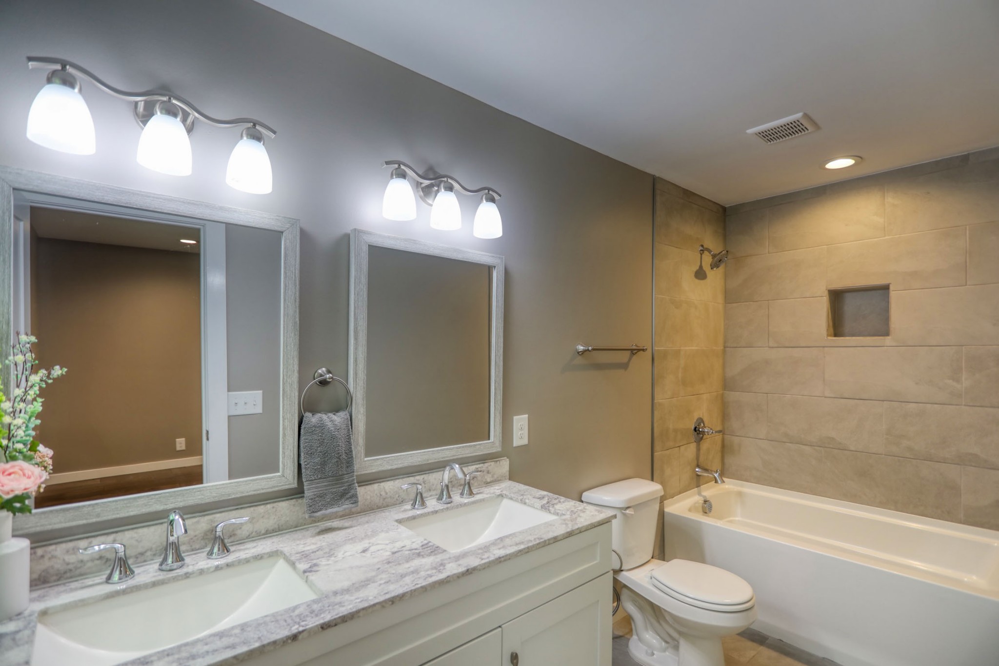 120 Vantrease Road Cottontown, TN 37048 - Photo 19 of 31 a bathroom with a granite countertop sink toilet mirror and shower
