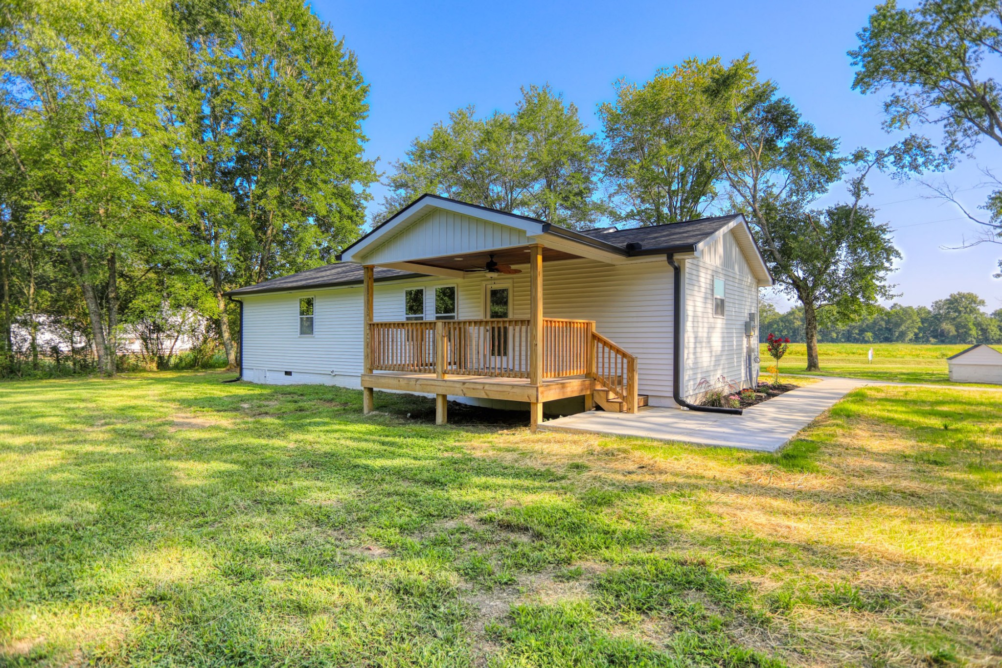 120 Vantrease Road Cottontown, TN 37048 - Photo 25 of 31 a front view of a house with garden