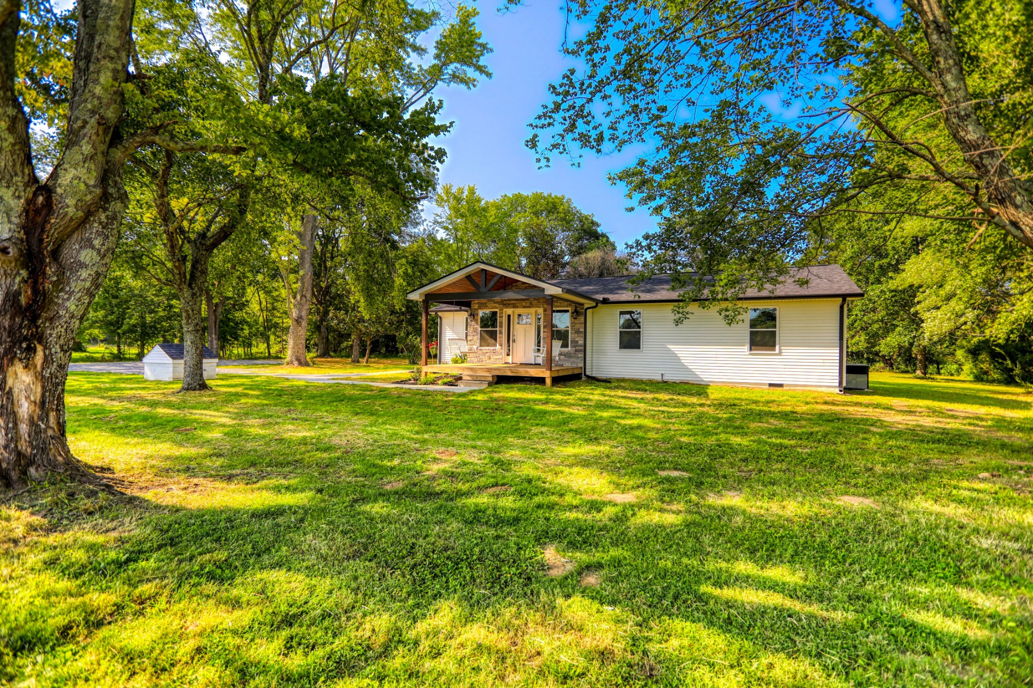 120 Vantrease Road Cottontown, TN 37048 - Photo 3 of 31 a front view of house with yard and green space