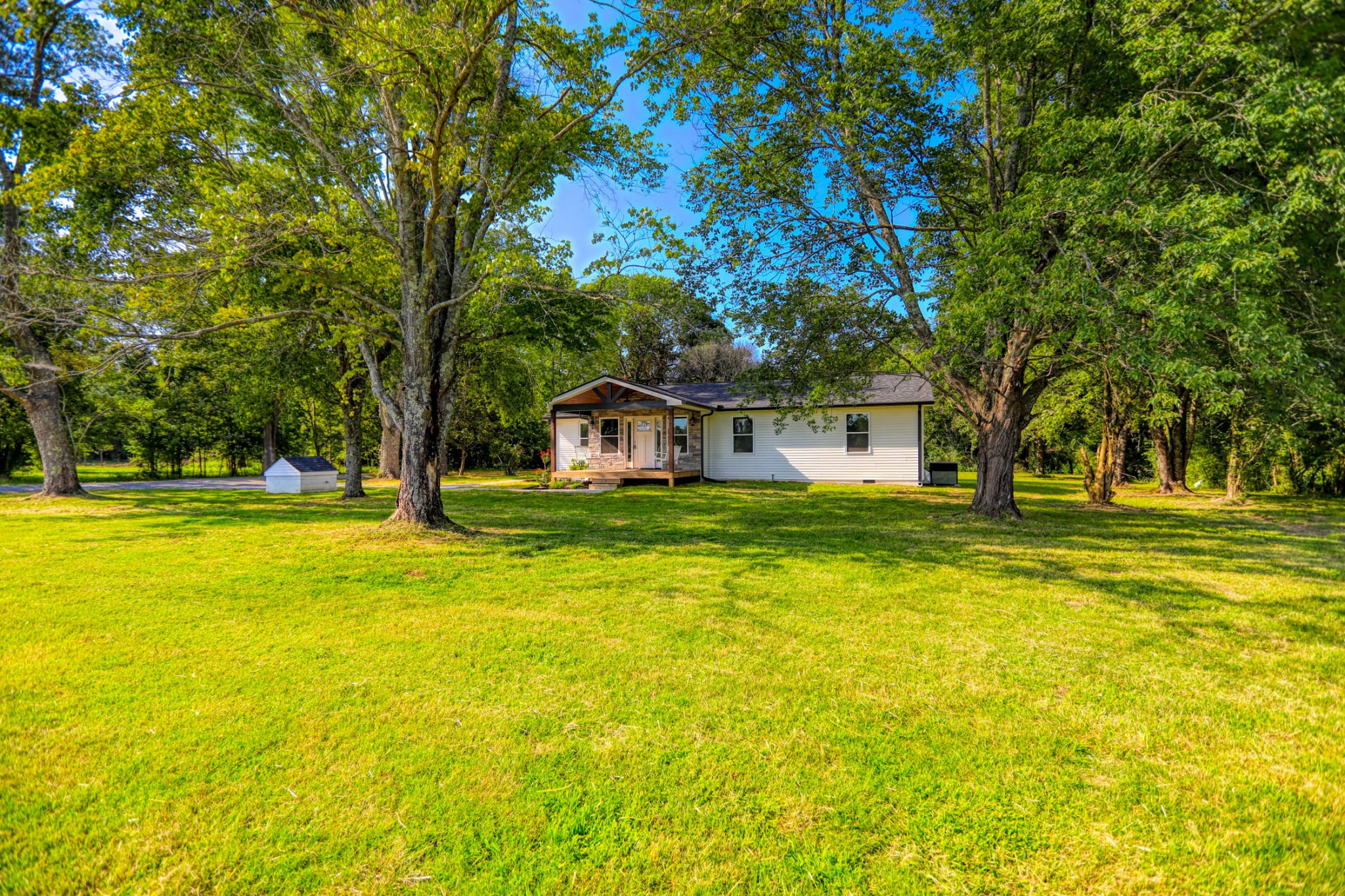 120 Vantrease Road Cottontown, TN 37048 - Photo 4 of 31 a house view with swimming pool in front of it
