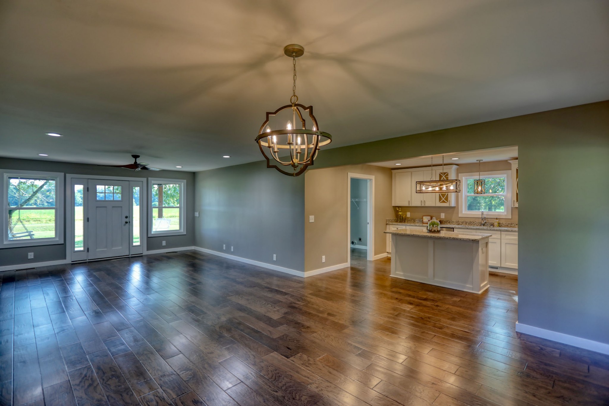 120 Vantrease Road Cottontown, TN 37048 - Photo 8 of 31 a view of an empty room with window and wooden floor