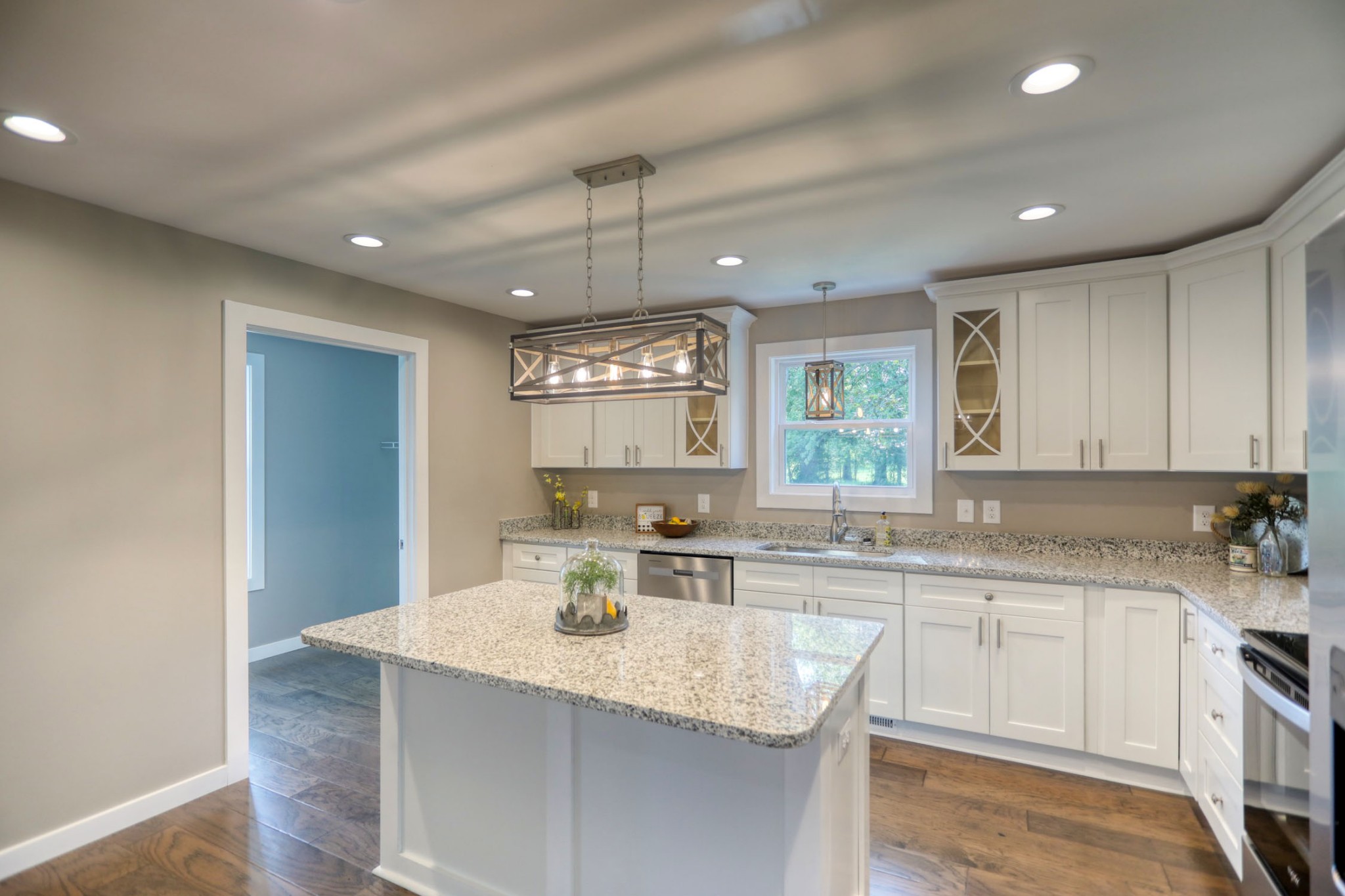 120 Vantrease Road Cottontown, TN 37048 - Photo 10 of 31 a kitchen with center island wooden cabinets and white appliances
