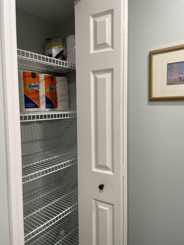 16100 Golf Club Road, Unit 301 Weston, FL 33326 - Photo 18 of 22 Closet in powder room
