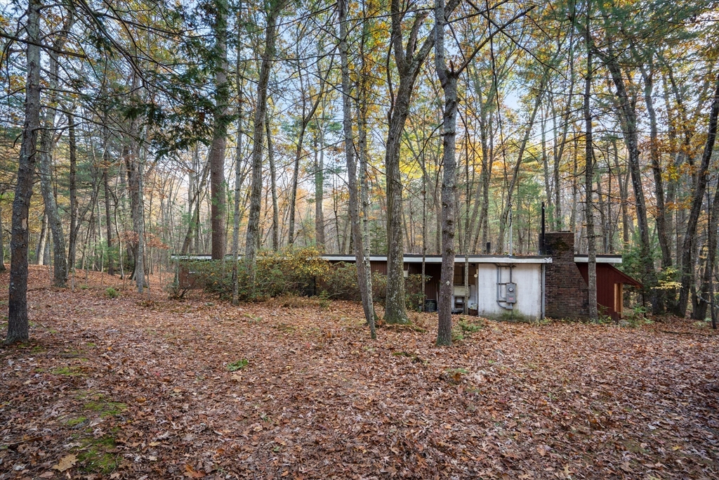 89 Lexington Road Lincoln, MA 01773 - Photo 2 of 9 a view of outdoor space with deck and yard